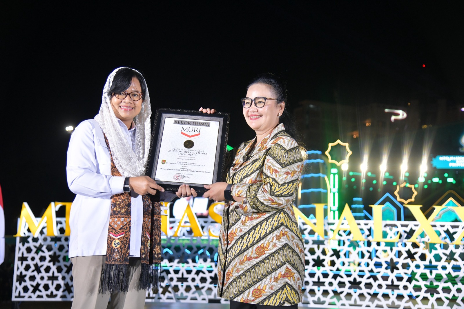 Gema Mars MTQ Nasional XXXI Pecahkan Rekor MURI, Agustina Bangga dengan Kerukunan Warga Gema Mars MTQ Nasional XXXI Pecahkan Rekor MURI, Agustina Bangga dengan Kerukunan Warga